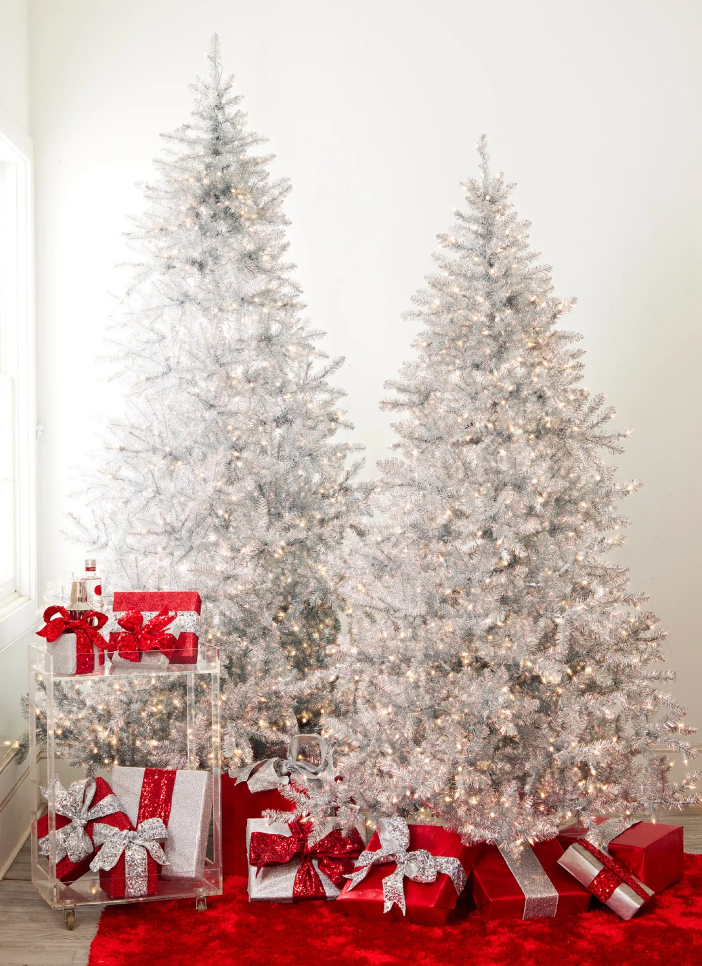 Raz Imports Raz 7.5' or 9' Silver Tinsel Christmas Tree with Forever Lit Clear Lights Sale