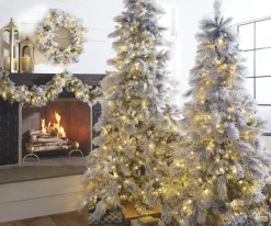 Raz Imports Raz 7.5' or 9' Pre Lit Flocked Pine Christmas Tree Outlet