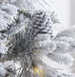 Raz Imports Raz 7.5' or 9' Pre Lit Flocked Pine Christmas Tree Outlet